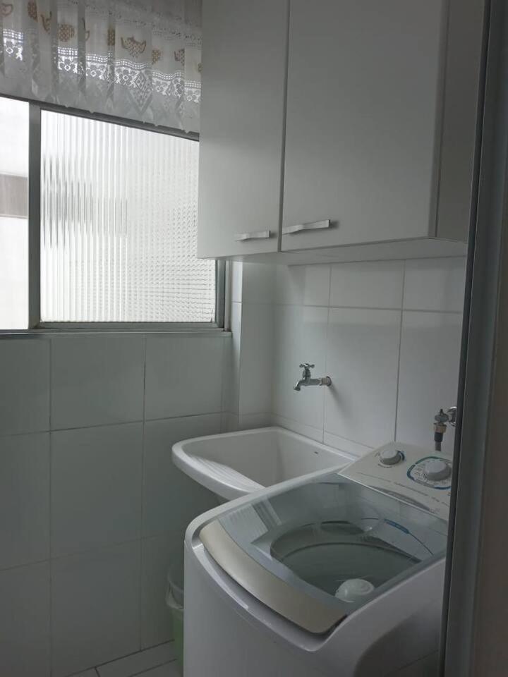 Apartamento completo na calçada da praia Apartment Guaruja Bagian luar foto